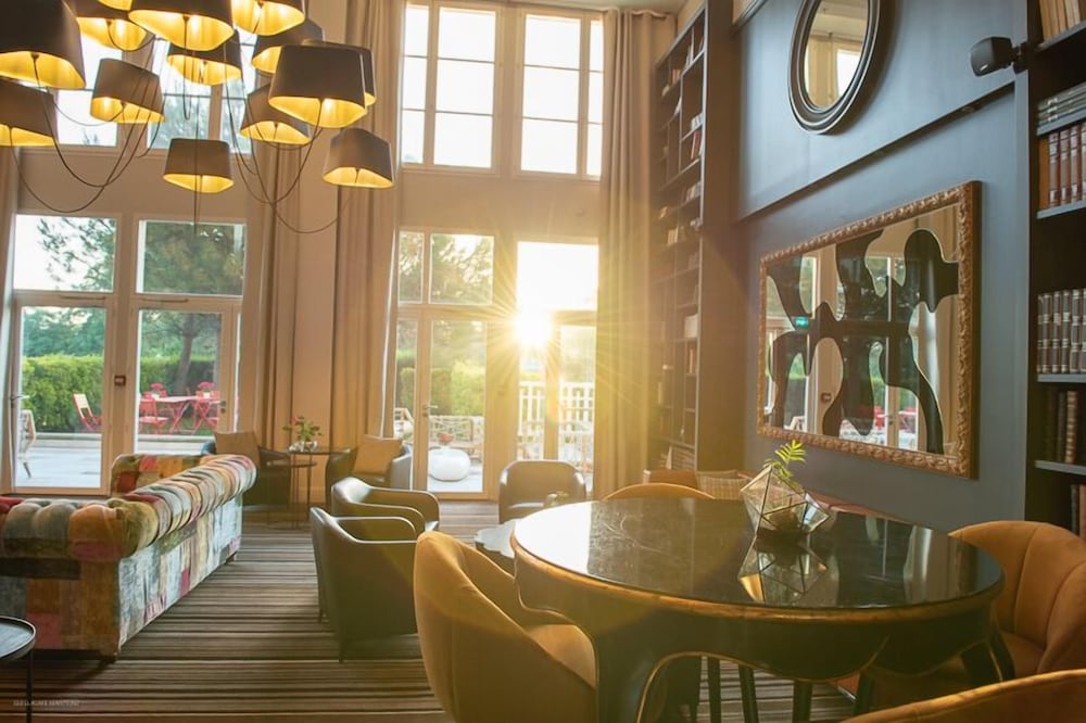 Фото Renaissance Paris Hippodrome De St. Cloud Hotel