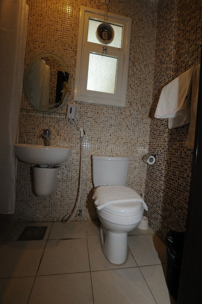 Фото Al Muhanna Plaza Hotel