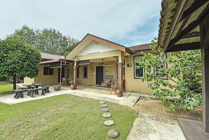 Гостиница Oyo 90692 Tok Babah Village Homestay