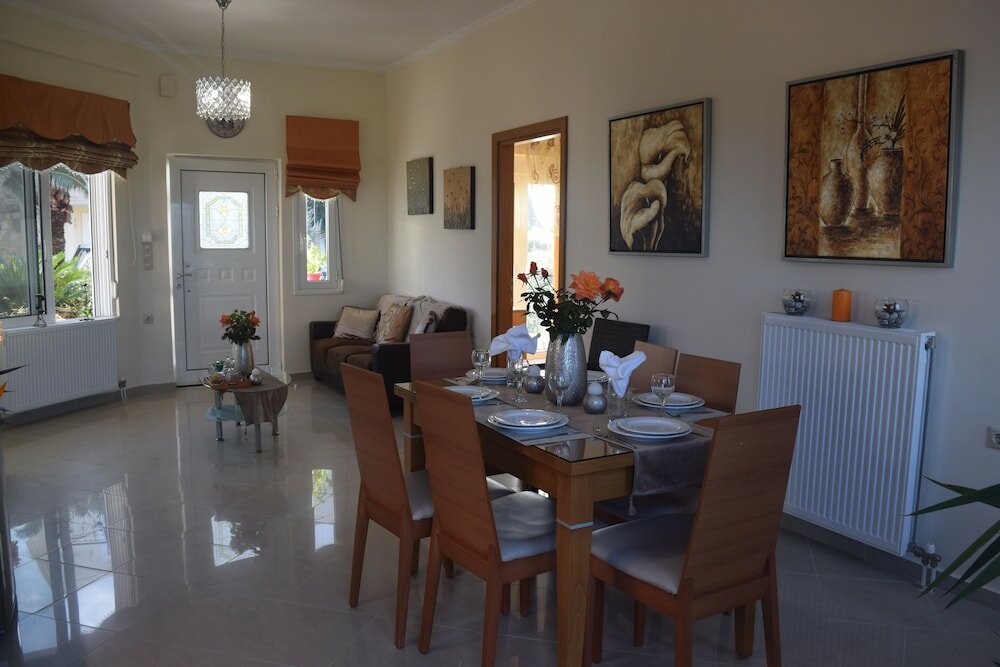 Фото Zoi's Holidays Apartment