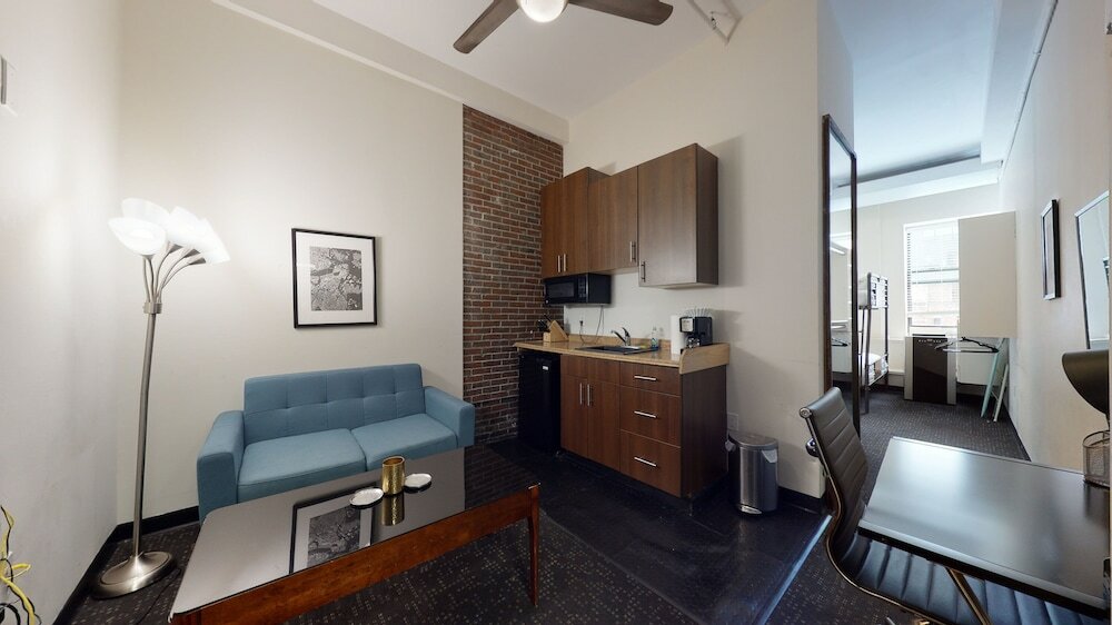 Фото Temple Place Suites