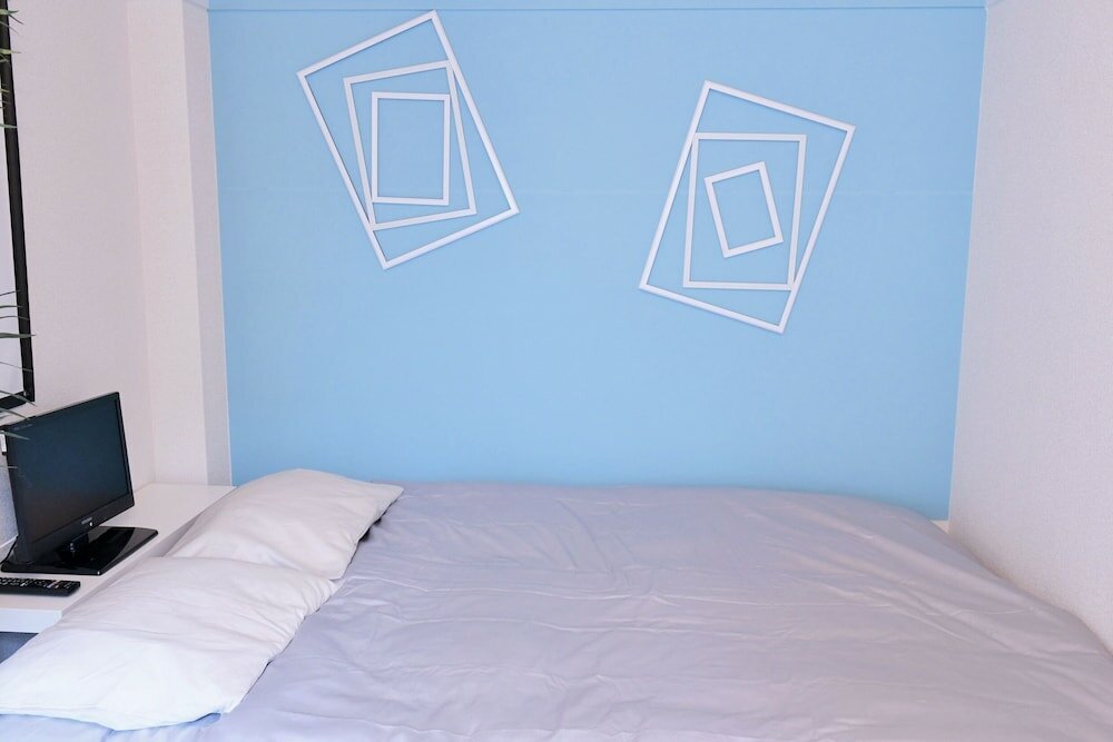 Фото Local Nishijin Apartment