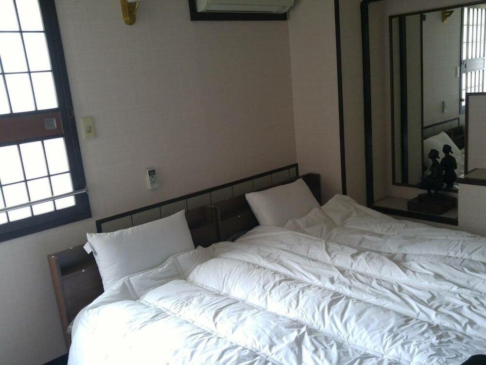 Фото Guesthouse & Hotel Ra Kagoshima