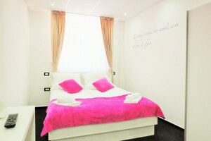 Гостиница Artorius Luwiana Suites