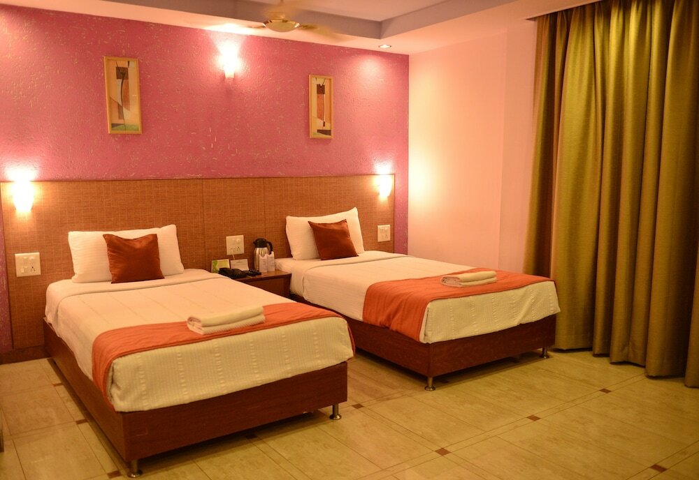 Фото Goa Woodlands Hotel