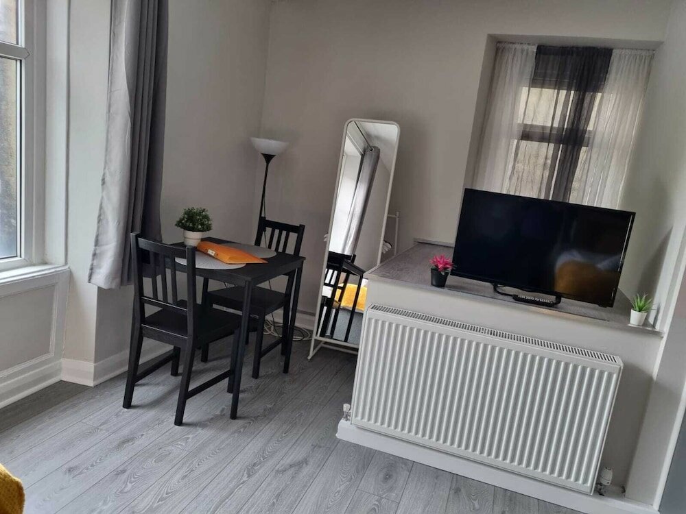 Фото Grey Stone Studio Apartments