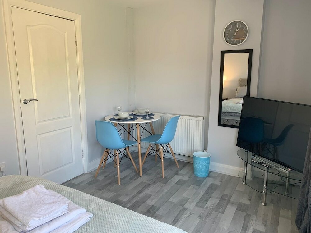 Фото Grey Stone Studio Apartments