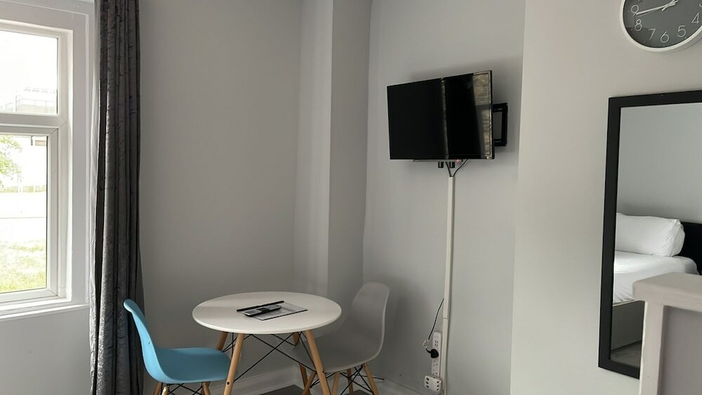 Фото Grey Stone Studio Apartments