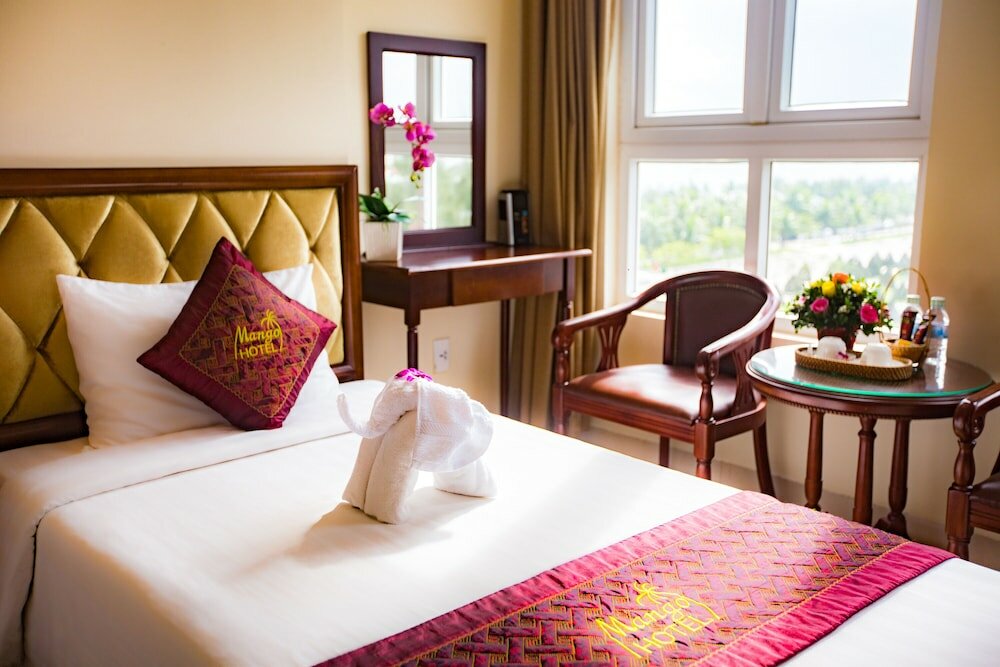 Фото Grand Mango Hotel