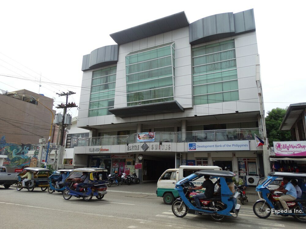 Фото Empire Suites Hotel