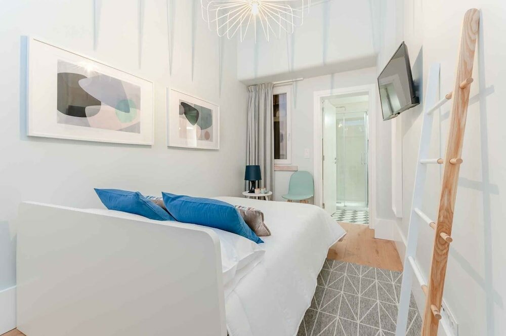 Фото Nlc Rooms & Suites