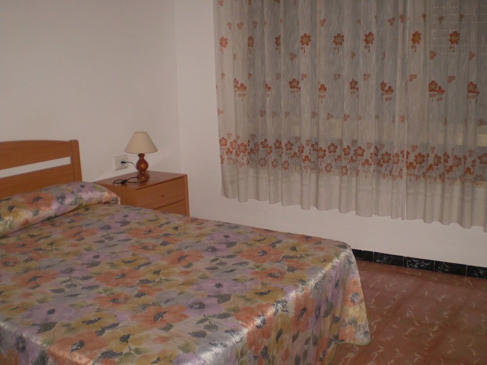 Фото Apartamentos El Oasis