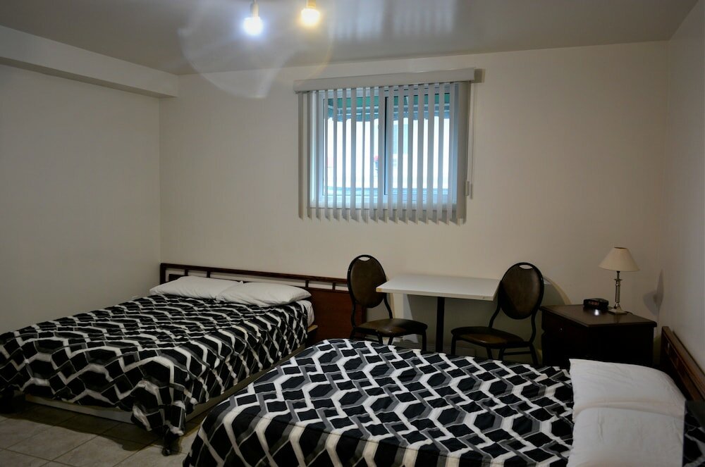 Фото Motel Quatre Saisons