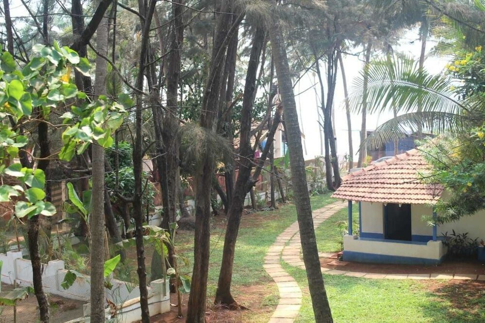 Фото Hotel Dhuni Resorts goa