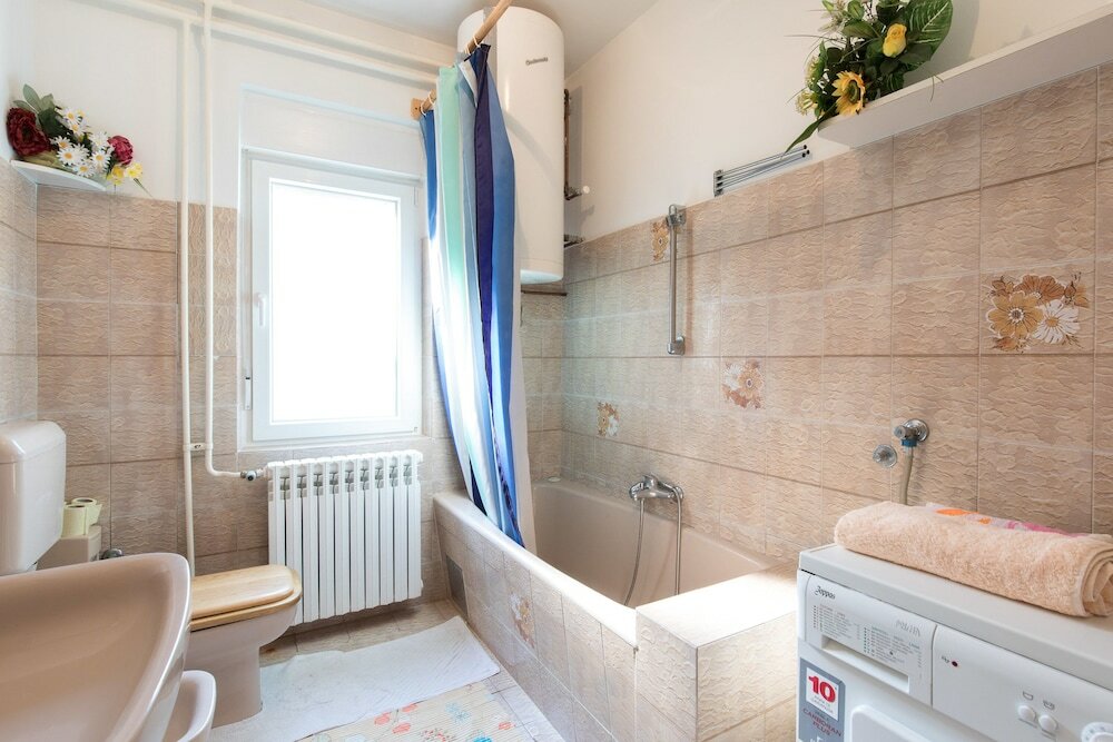 Фото Apartment Lucia & Holiday Home Nino