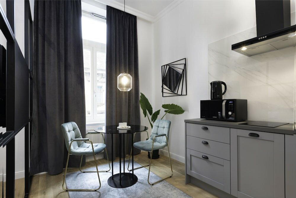 Фото Pierrot & Pierrette Apartments