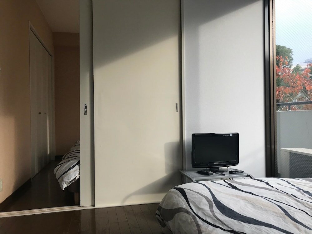 Фото Nipponbashi Dotonbori Apartment