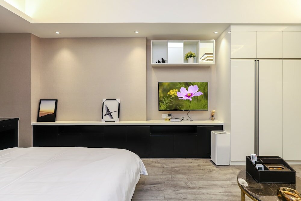 Фото Yue Qi Hotel Apartment