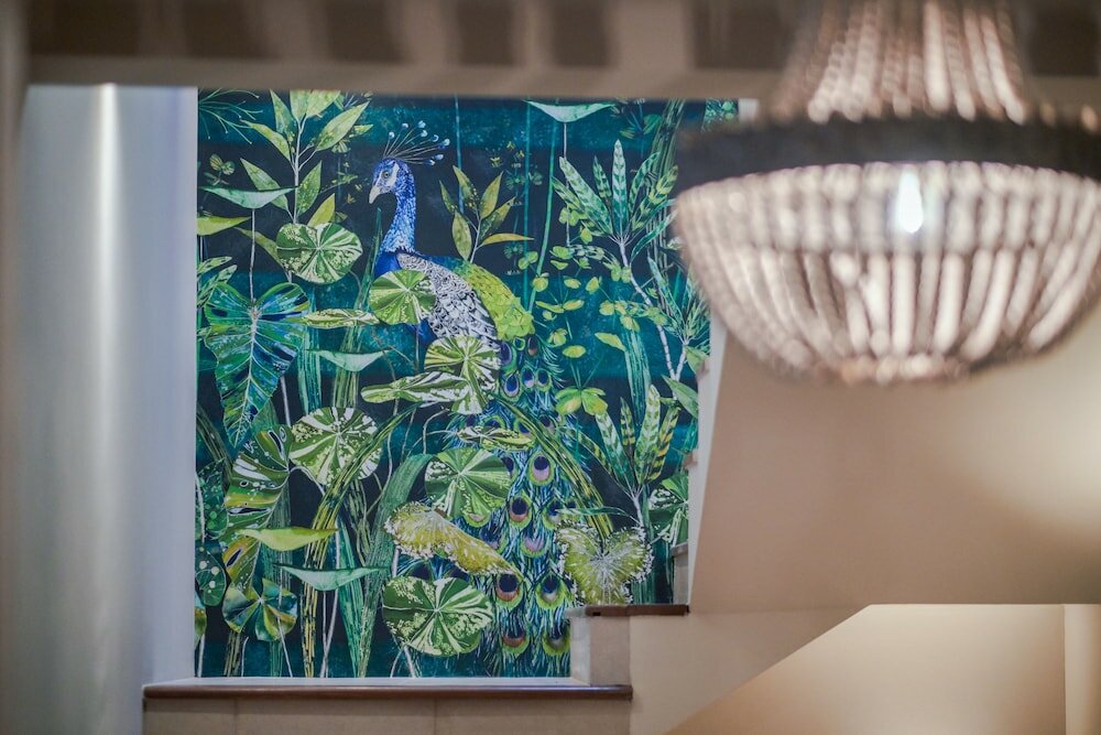 Фото Peacock Boutique Apartments