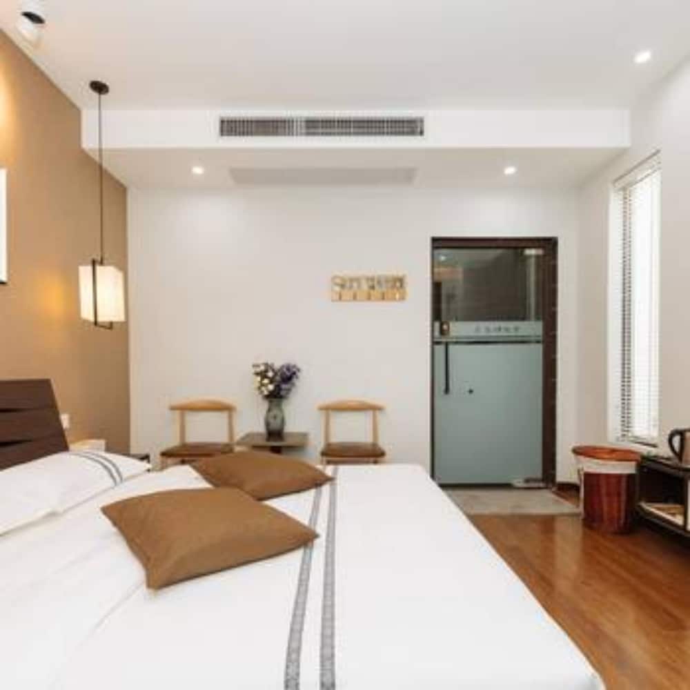 Фото Floral Hotel Nanjing Zuolingyoushe