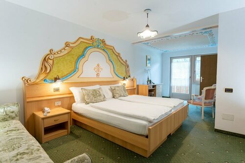 Гостиница Latemar Hotel Suites & SPA