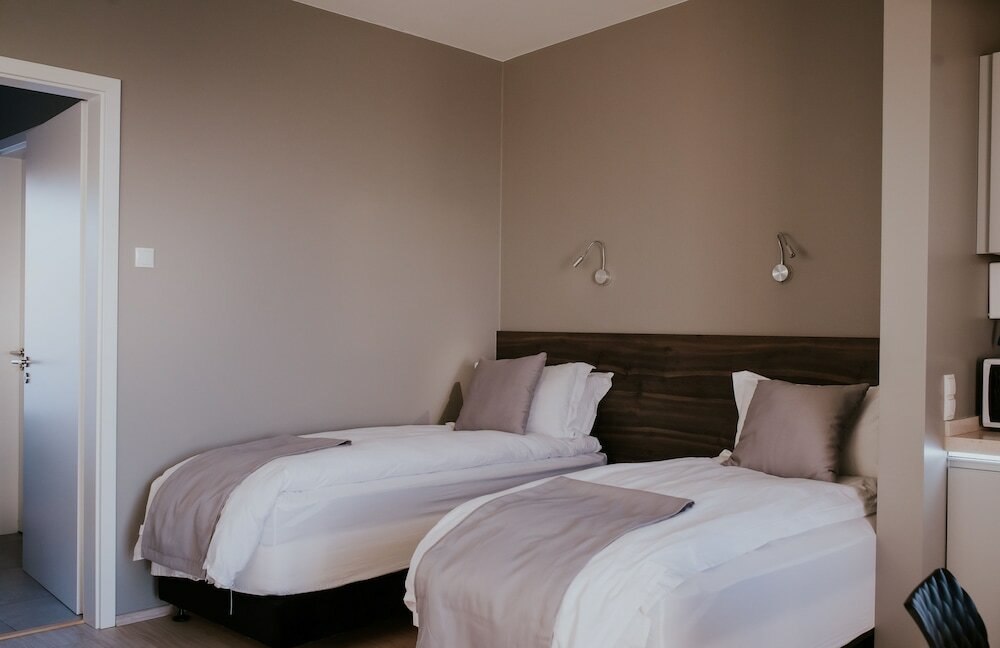 Фото Black Beach Suites