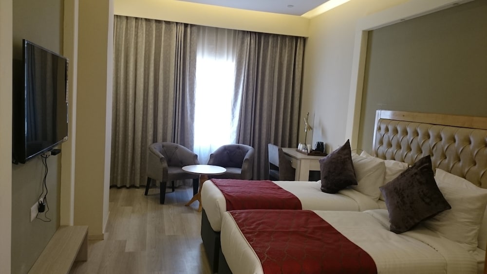 Фото Mango Hotels Naveen