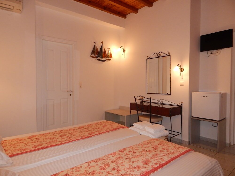 Фото Tinos Suites & Apartments