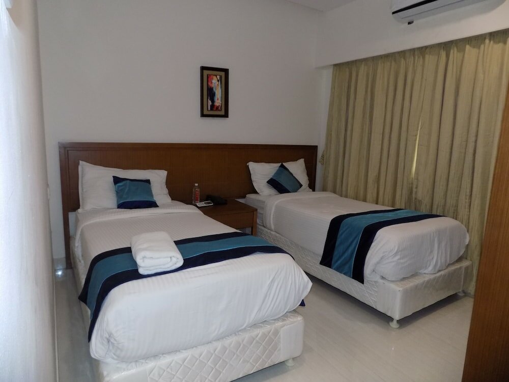 Фото Mint Magna Suites