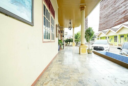 Гостиница Oyo 2177 Trikora Indah Residence в Палембанге