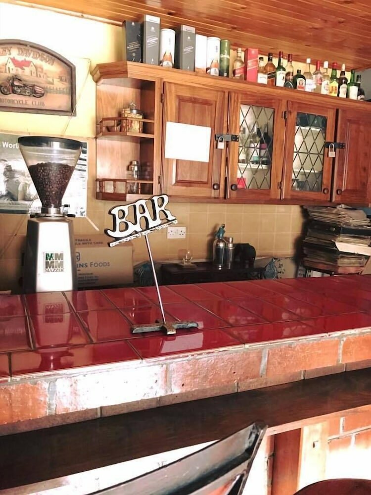 Фото It's a Small World Backpackers Lodge - Hostel