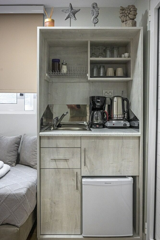 Фото Comfort Stay Airport Studios - Free shuttle from the Athens Airport