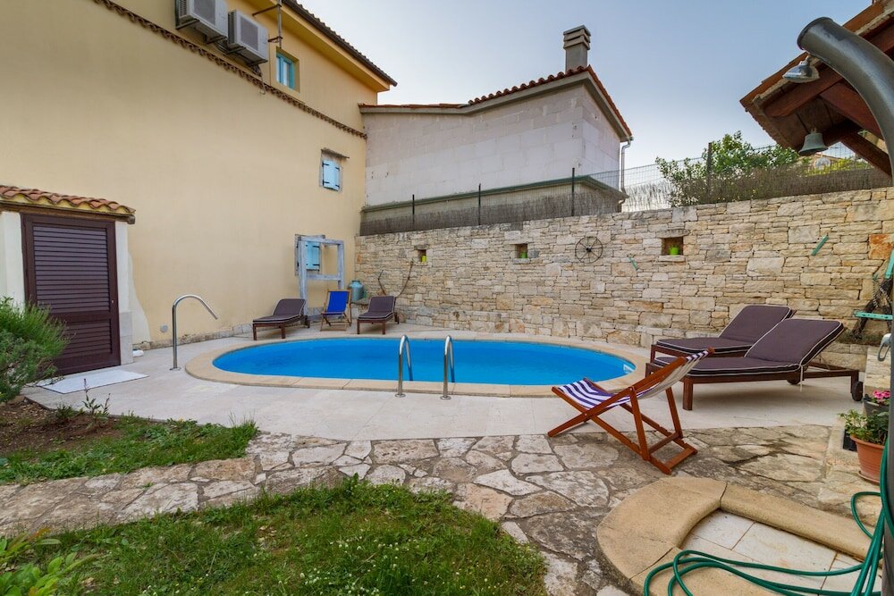 Фото Especially charm stone house with a pool