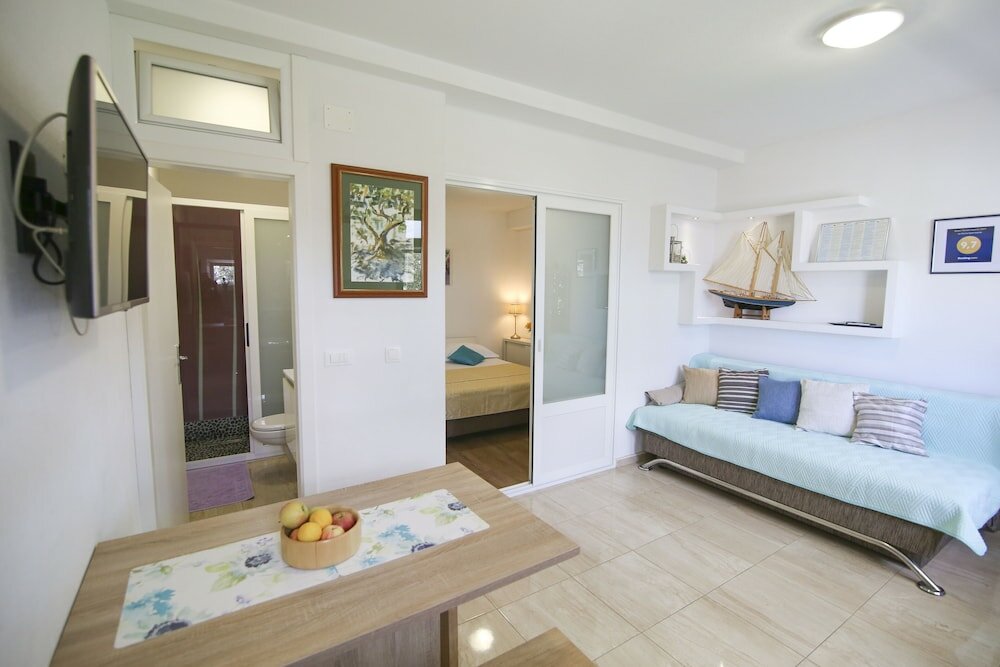 Фото La Storia Apartments