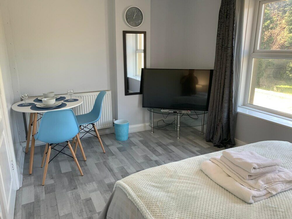 Фото Grey Stone Studio Apartments