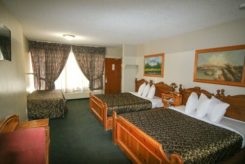 Гостиница Bighorn Inn & Suites