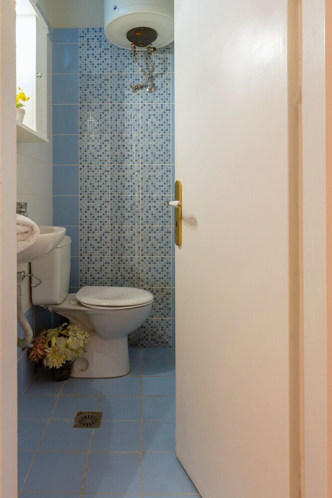 Фото Sidewalk Apartment