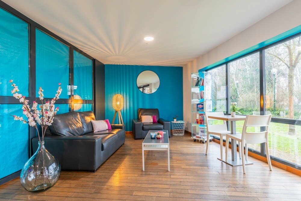 Фото Zenitude Hôtel - Résidences Magny les Hameaux