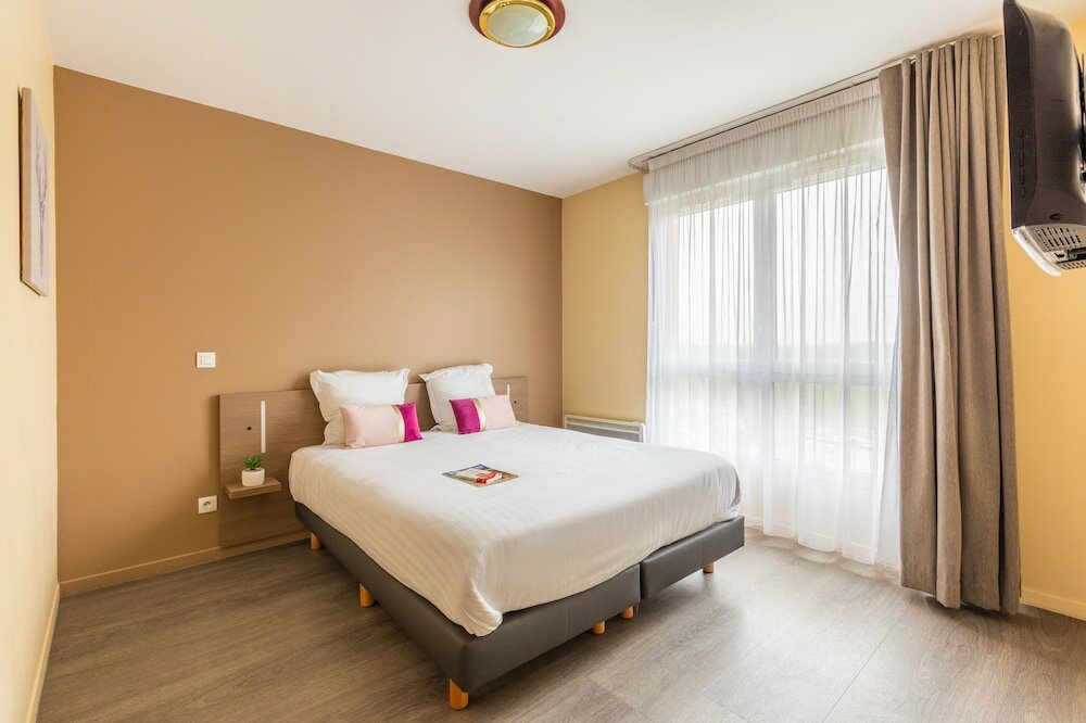 Фото Zenitude Hôtel - Résidences Magny les Hameaux