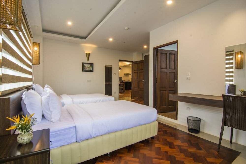 Фото Woodside Inn & Serviced Apartments