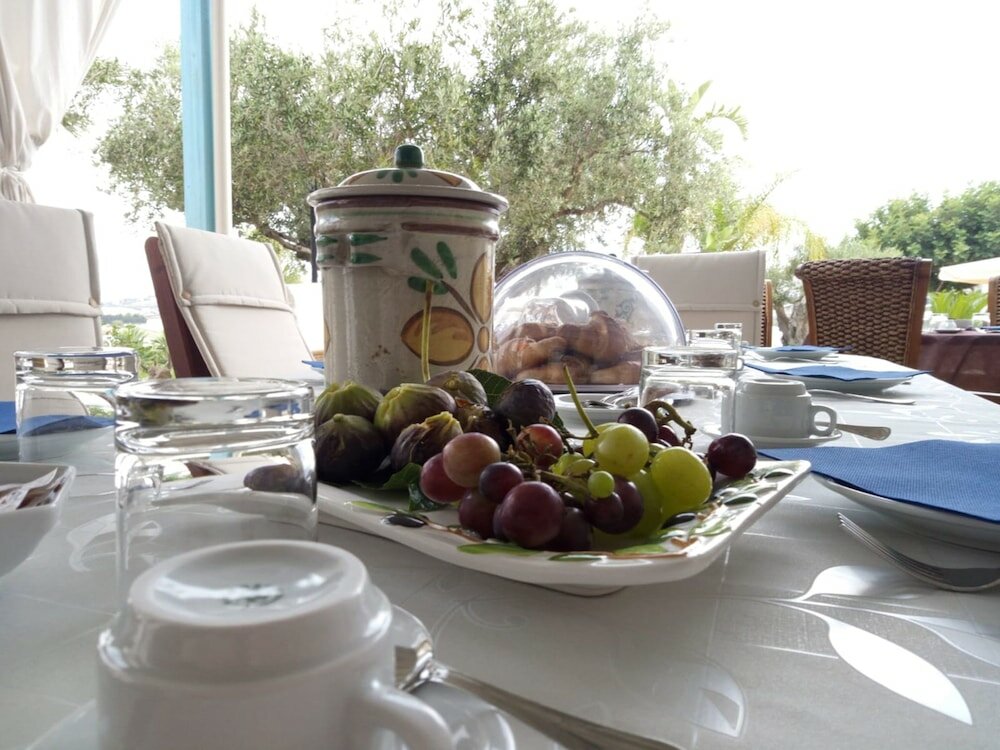 Фото Punta Bianca Suite&Home Experience