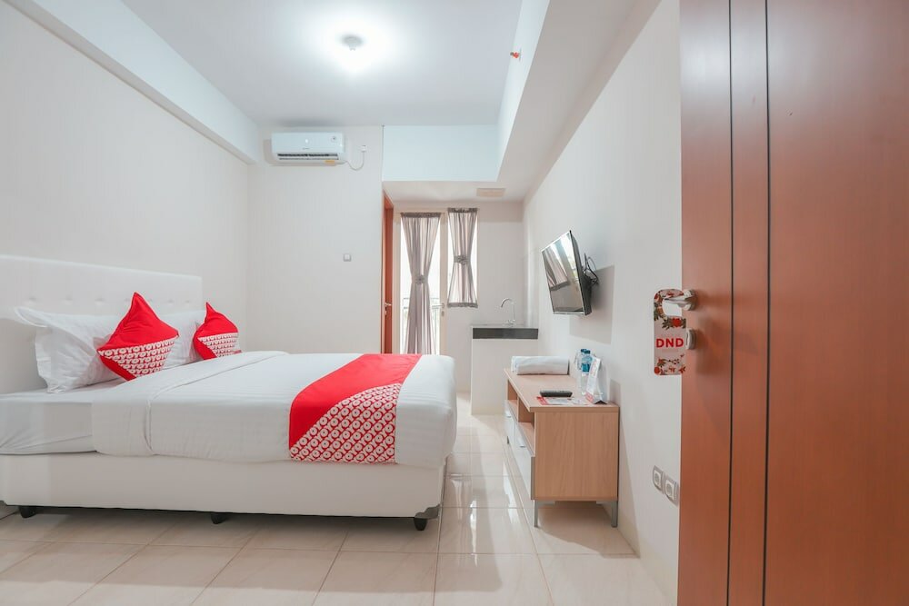 Фото Oyo 498 Green Lake View Ciputat Syariah