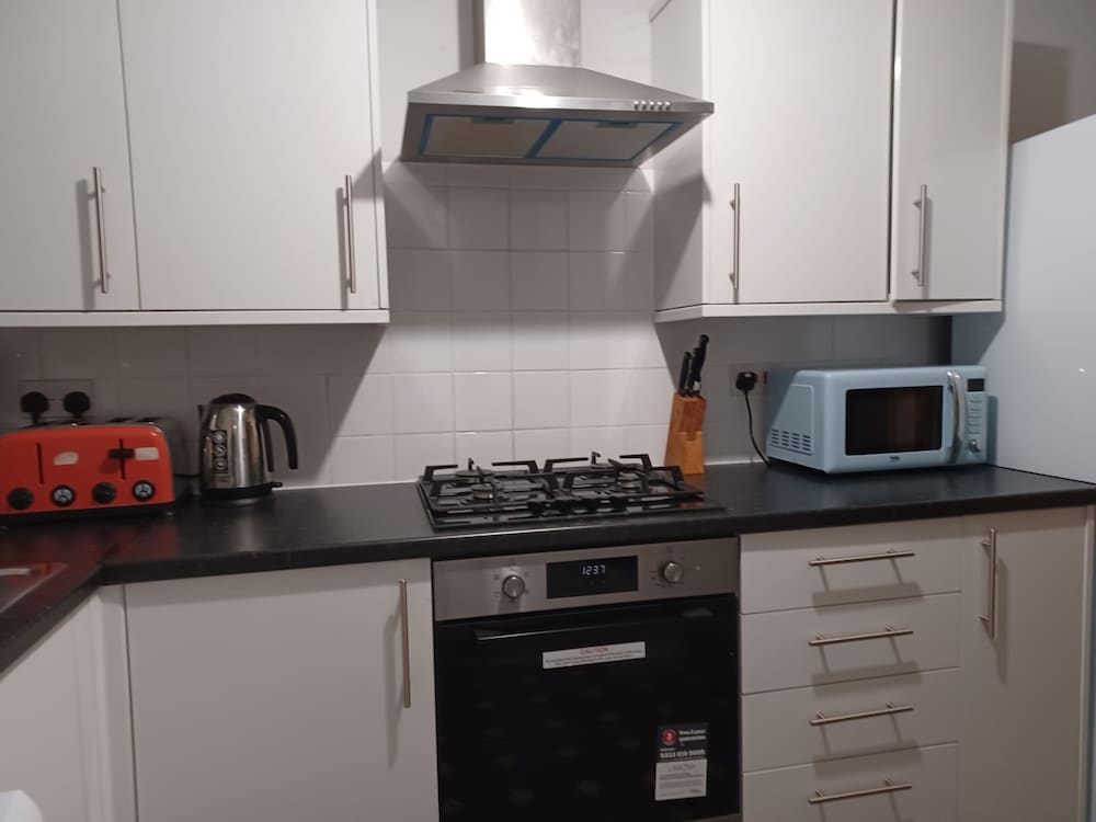 Фото Huku Kwetu - Fieldfare Green