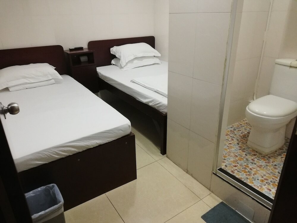 Фото New China Guesthouse