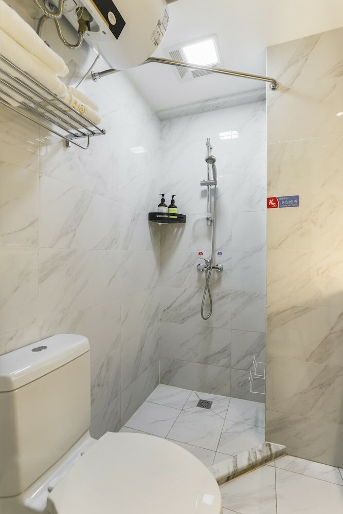 Фото Yue Qi Hotel Apartment