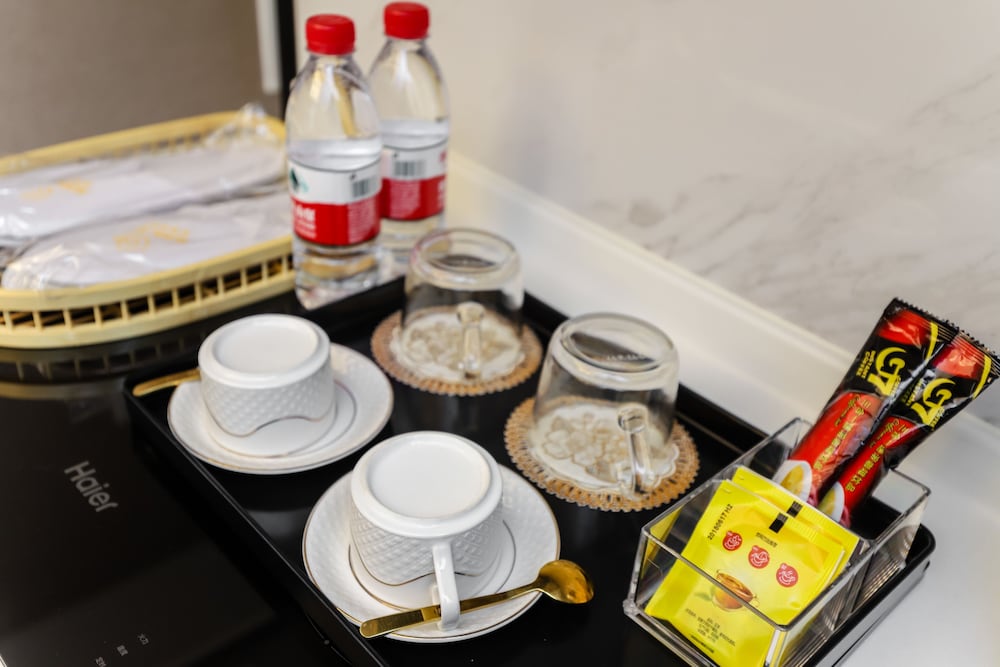 Фото Yue Qi Hotel Apartment