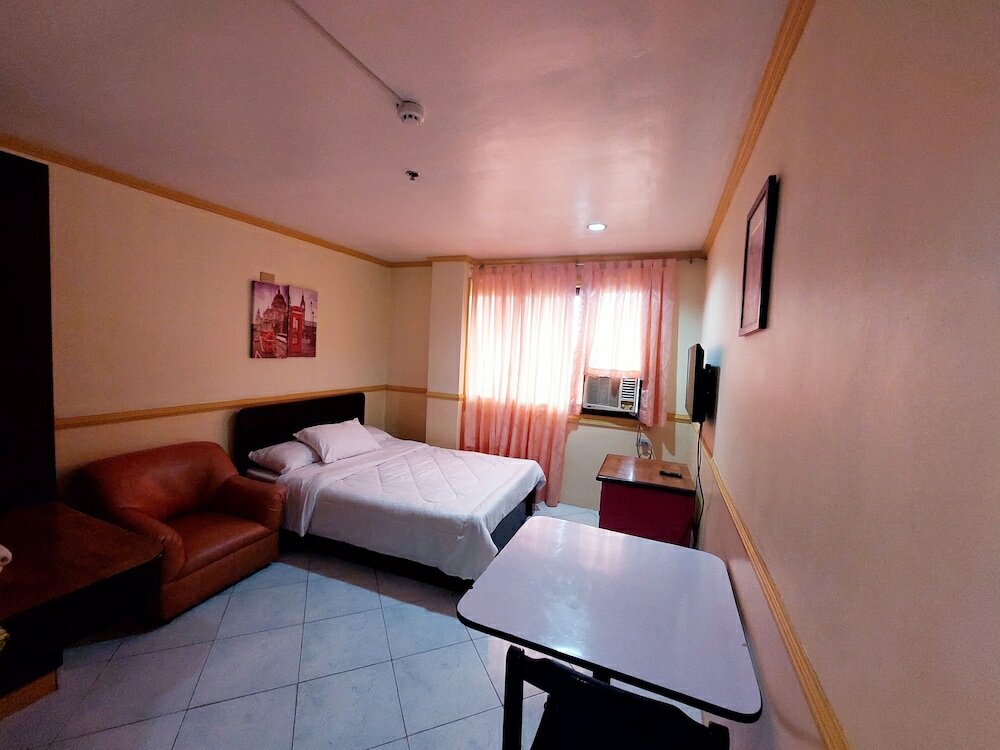 Фото Tabaco Gardenia Hotel