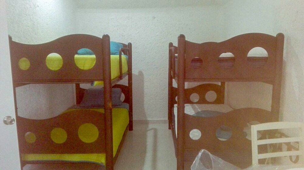 Фото Pok-Ta-Pok Guest House