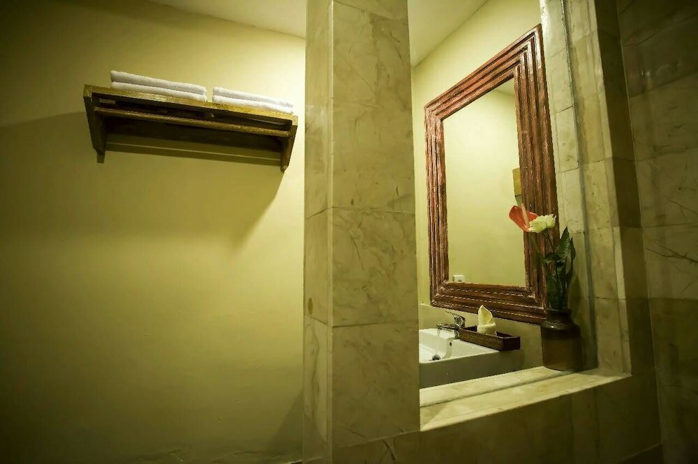 Фото Tuga Guest House Ubud