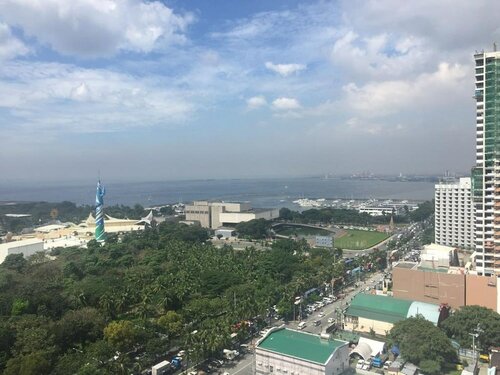 Гостиница Breeze Residences Condo